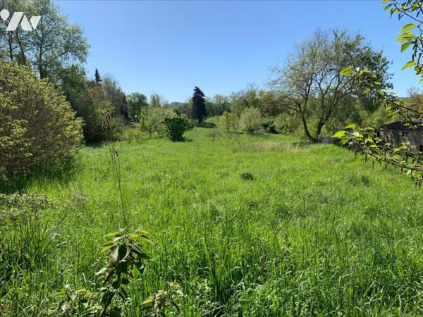 Terrain à bâtir proche centre village