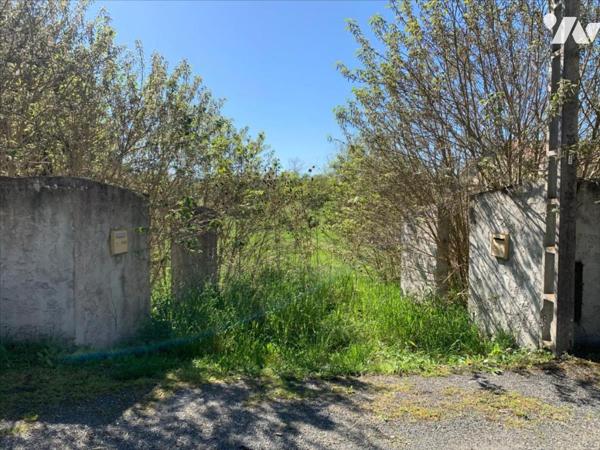 Terrain à bâtir proche centre village