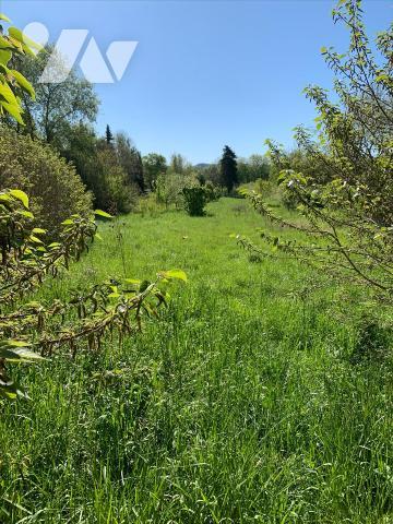Terrain à bâtir proche centre village
