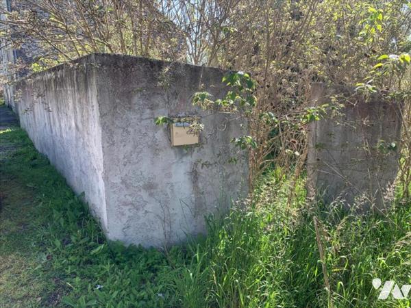 Terrain à bâtir proche centre village