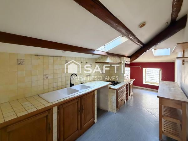 198 m², garage et terrasse en centre-ville