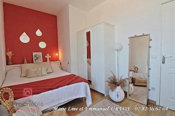 Appartement T3 bis de 109 m² dans bel immeuble avec ascenseur et place de parking sécurisée