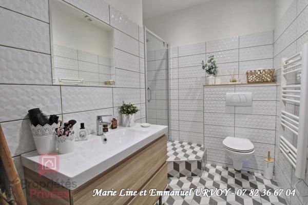Appartement T3 bis de 109 m² dans bel immeuble avec ascenseur et place de parking sécurisée
