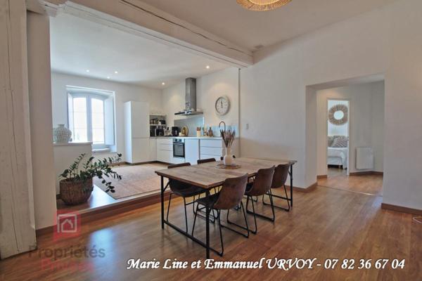 Appartement T3 bis de 109 m² dans bel immeuble avec ascenseur et place de parking sécurisée