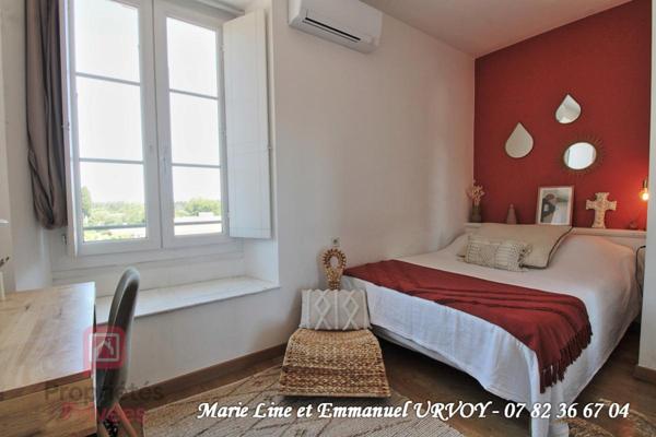 Appartement T3 bis de 109 m² dans bel immeuble avec ascenseur et place de parking sécurisée