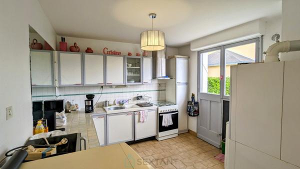 Grande maison familiale à deux pas des écoles et du collège dans le centre de Caudan.