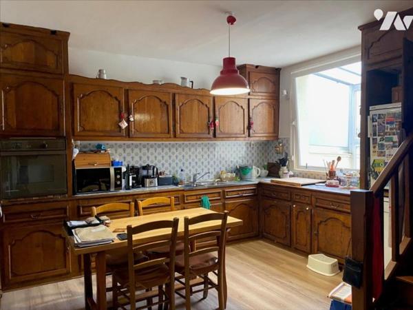 Centre Ville Maison avec 4 chambres offrant de beaux volumes