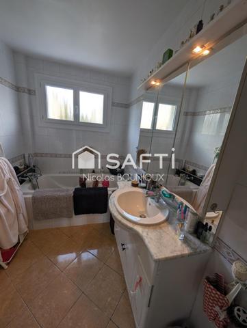 Maison familiale avec vue panoramique – Véranda – Jardin arboré – Garage