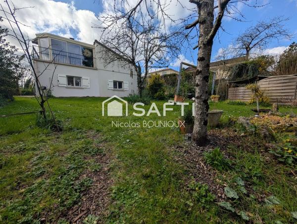 Maison familiale avec vue panoramique – Véranda – Jardin arboré – Garage