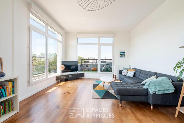 Appartement en dernier étage avec terrasse et vue Seine