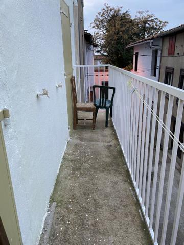 Immeuble avec 2 appartements loués et garages libres en rez-de-chaussée