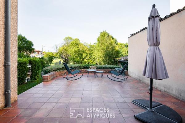Maison de caractère atypique avec terrasse et jardin