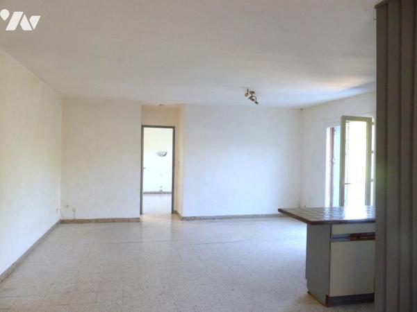 A VENDRE APPARTEMENT T2  A RENOVER  AVEC TERRASSE+ CAVE +1 PLACE DE PARKING