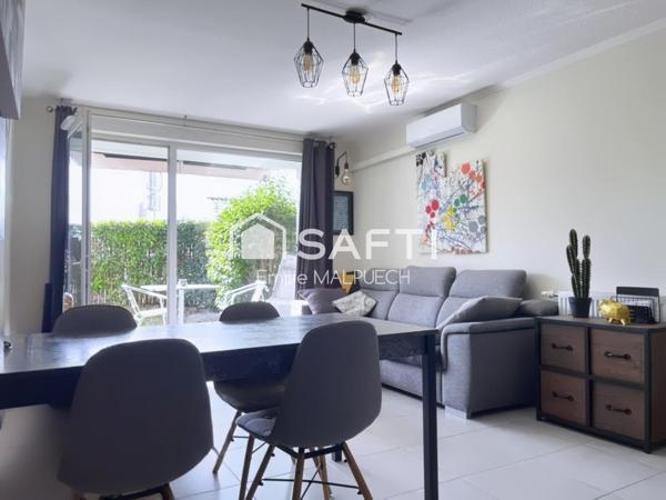 T3 traversant avec jardin et parking à Saint Alban