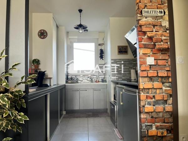 T3 traversant avec jardin et parking à Saint Alban