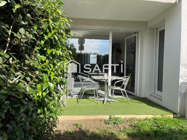 T3 traversant avec jardin et parking à Saint Alban