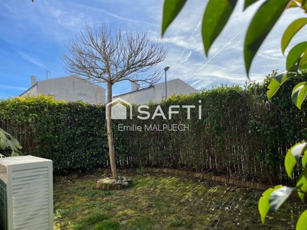 T3 traversant avec jardin et parking à Saint Alban