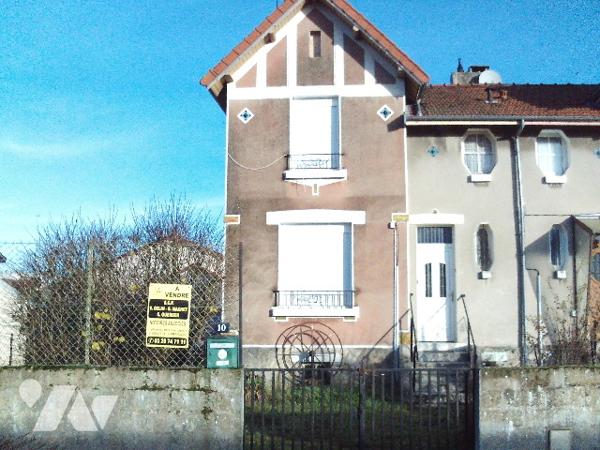 Maison de ville de 87 m² avec jardin et sous sol