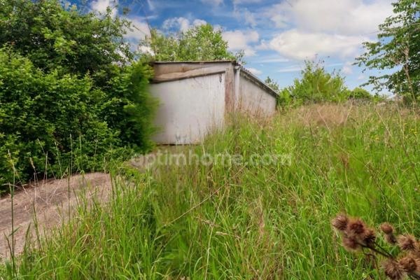 Maison de Ville sur deux niveaux - 3 pièces - 2 chambres - Dépendance - Garage - Terrain 609 m² - 87210 LE DORAT