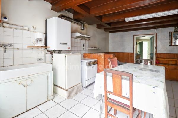 Maison de Ville sur deux niveaux - 3 pièces - 2 chambres - Dépendance - Garage - Terrain 609 m² - 87210 LE DORAT