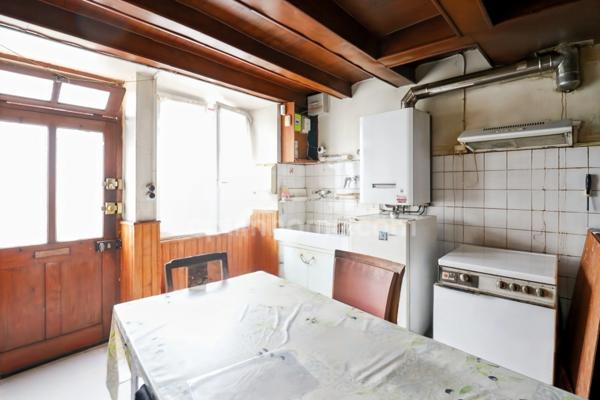 Maison de Ville sur deux niveaux - 3 pièces - 2 chambres - Dépendance - Garage - Terrain 609 m² - 87210 LE DORAT