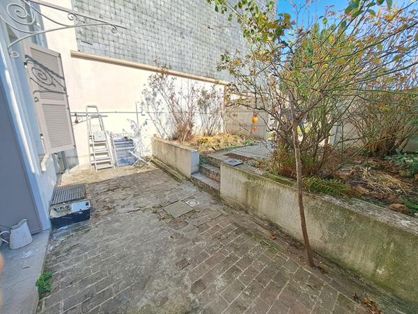 Maison de 148m² avec un petit jardin en centre ville de Mantes La Jolie