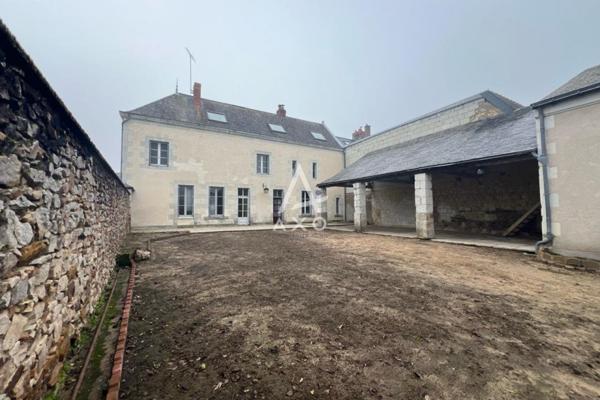 Maison de ville spacieuse et fonctionnelle avec un fort potentiel
