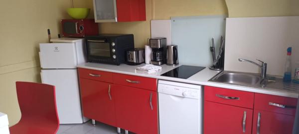 Proximité centre ville Dieppe .Immeuble de 3 Logements Meublé et un garage loué à l'année