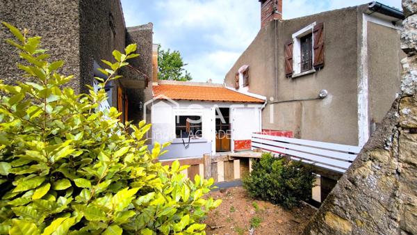 Maison de bourg en centre ville