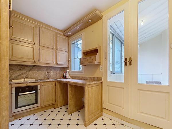 Appartement de caractère de 112 m² avec véranda, au cœur du centre-ville d’Avignon