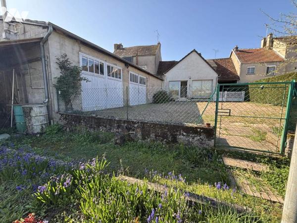 Maison et grand atelier 200 m du centre ville