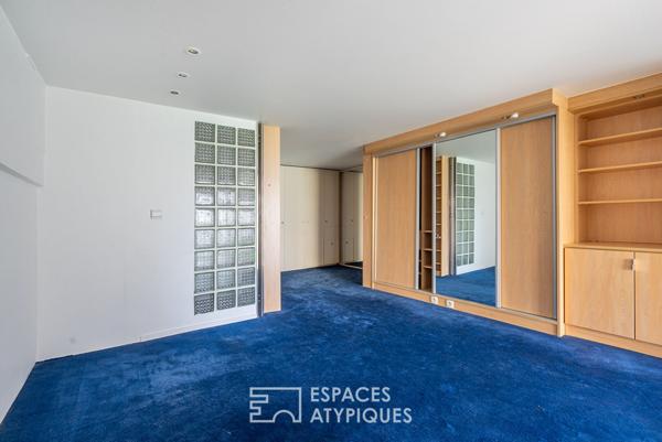 Duplex aux volumes exceptionnels près du parc des Buttes-Chaumont