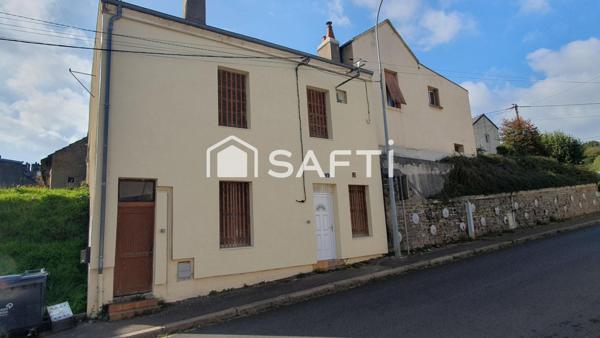 petit immeuble de deux appartement proche des grandes entreprises du Creusot et des universités .