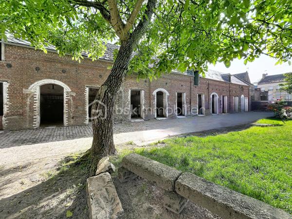 A 20 mins de Saint Quentin, dans une commune avec toutes les commodités nécessaires, cet ensemble immobilier est idéal pour les passionnés de chevaux ou personne ayant un projet agricole, touristique  ou dans l'événementiel ...

Composé d'une maison d'habitation , pleine de charme avec ses matériaux anciens ( parquets en chevrons, cheminées en marbre ...) et de nombreuses dépendances ( écuries, atelier, greniers ...) , l'ensemble est actuellement exploité en centre équestre.

La maison de 280 m2 offre de beaux volumes : accessible par deux entrées différentes, vous découvrirez au rez de chaussée une spacieuse pièce de vie de 45 m2, un ou deux bureaux selon vos besoins, une cuisine aménagée, une lingerie , une véranda avec vue sur toute la cour et des toilettes.

A l'étage, un vaste palier dessert quatre chambres et une salle d'eau rénovée ainsi que des toilettes indépendants ; vous disposerez de deux autres pièces supplémentaires ( bureau ou lingerie ...)

Un grenier de + 100 m2 pourra être entièrement aménagé.

L'extérieur dispose des infra structures  suivantes :

- une carrière de 75 X 25 m
- un manège de 30 X 13
- un paddock
- plusieurs dépendances avec au total 25 boxs
- des écuries 
- un club house 
- un atelier
- une sellerie

Les greniers des dépendances servent de lieux de stockage et peuvent être exploités.

UN BIEN RARE DE PAR SON POTENTIEL ! Que vous soyez un particulier en quête d'un projet de vie ou un investisseur à la recherche d'une belle opportunité, cette propriété n'attend plus que votre imagination .... 

CONTACTEZ MOI POUR UNE VISITE
