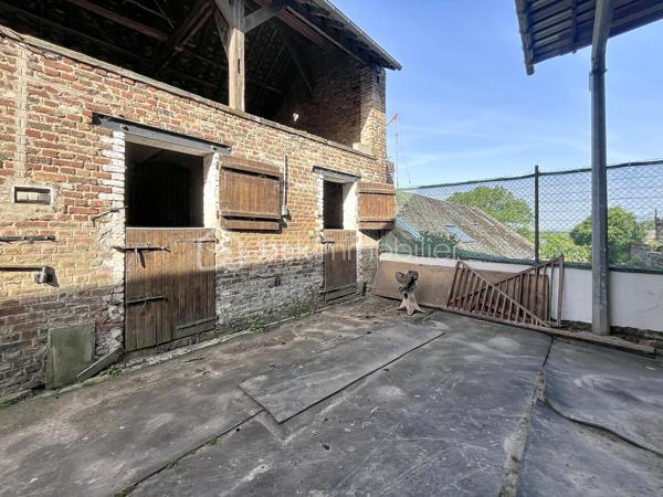 A 20 mins de Saint Quentin, dans une commune avec toutes les commodités nécessaires, cet ensemble immobilier est idéal pour les passionnés de chevaux ou personne ayant un projet agricole, touristique  ou dans l'événementiel ...

Composé d'une maison d'habitation , pleine de charme avec ses matériaux anciens ( parquets en chevrons, cheminées en marbre ...) et de nombreuses dépendances ( écuries, atelier, greniers ...) , l'ensemble est actuellement exploité en centre équestre.

La maison de 280 m2 offre de beaux volumes : accessible par deux entrées différentes, vous découvrirez au rez de chaussée une spacieuse pièce de vie de 45 m2, un ou deux bureaux selon vos besoins, une cuisine aménagée, une lingerie , une véranda avec vue sur toute la cour et des toilettes.

A l'étage, un vaste palier dessert quatre chambres et une salle d'eau rénovée ainsi que des toilettes indépendants ; vous disposerez de deux autres pièces supplémentaires ( bureau ou lingerie ...)

Un grenier de + 100 m2 pourra être entièrement aménagé.

L'extérieur dispose des infra structures  suivantes :

- une carrière de 75 X 25 m
- un manège de 30 X 13
- un paddock
- plusieurs dépendances avec au total 25 boxs
- des écuries 
- un club house 
- un atelier
- une sellerie

Les greniers des dépendances servent de lieux de stockage et peuvent être exploités.

UN BIEN RARE DE PAR SON POTENTIEL ! Que vous soyez un particulier en quête d'un projet de vie ou un investisseur à la recherche d'une belle opportunité, cette propriété n'attend plus que votre imagination .... 

CONTACTEZ MOI POUR UNE VISITE