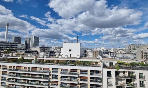 A louer PARIS 15 NORD  grand F4  traversant étage élevé balcon