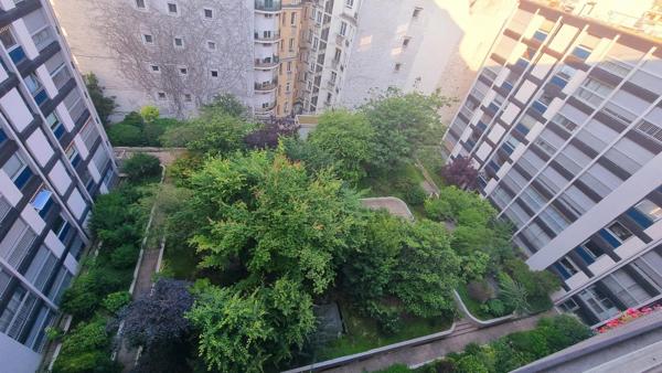 A louer PARIS 15 NORD  grand F4  traversant étage élevé balcon