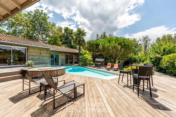 Maison de plain-pied avec jardin arboré et piscine au coeur de Limonest