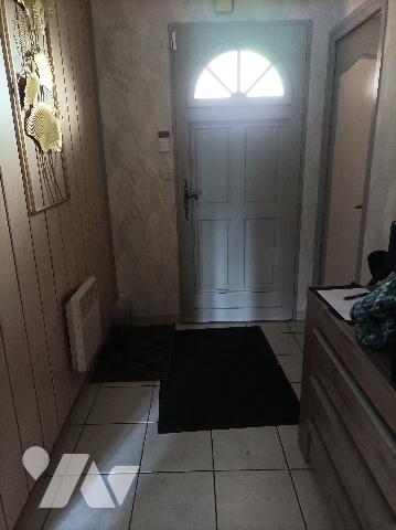 Plain pied individuel en briques, proche du centre ville.