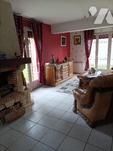 Plain pied individuel en briques, proche du centre ville.