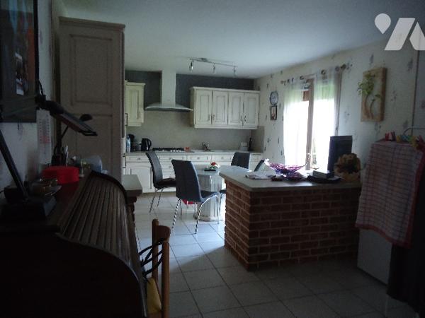 Plain pied individuel en briques, proche du centre ville.