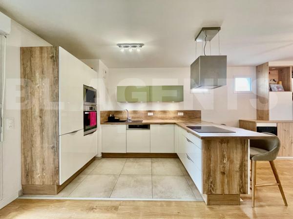 T4 de 78 m2 - Quartier centre ville avec jardin et parking.