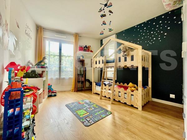 T4 de 78 m2 - Quartier centre ville avec jardin et parking.