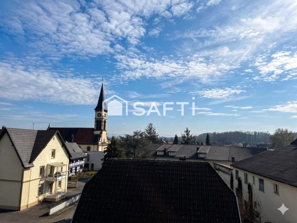 Hésinge - Dernier étage : F3/F4 lumineux  avec vue panoramique sur le village et son clocher"