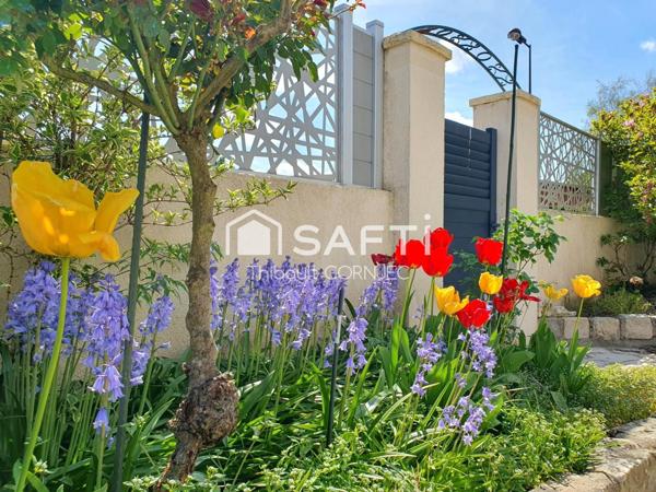Maison familiale 120 m², 5 chambres, grand jardin avec arbres fruitiers, double garage avec fosse.