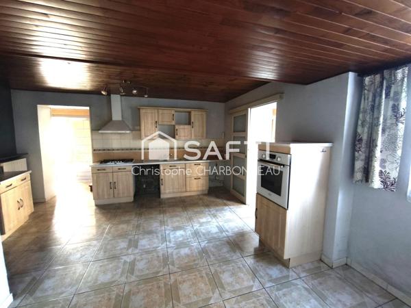 MAISON CENTRE BOURG A LA BVOUSSAC A RENOVER