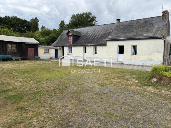 Cette charmante fermette de plain pied avec terrain terrain agricole et plan d'eau.