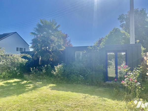 Maison de ville avec garage et jardin
