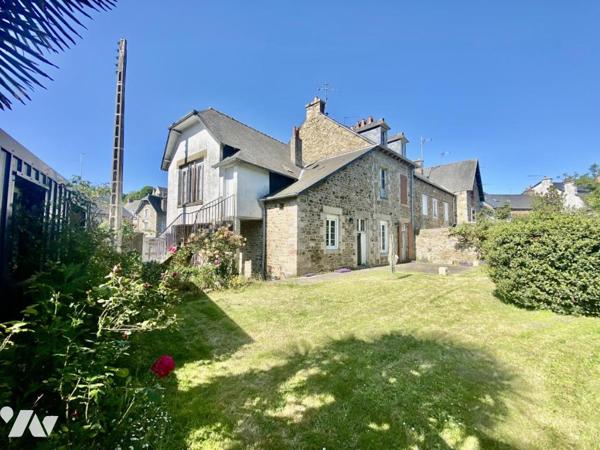Maison de ville avec garage et jardin