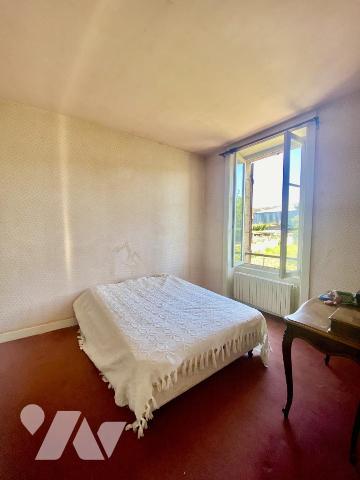 Maison de ville avec garage et jardin